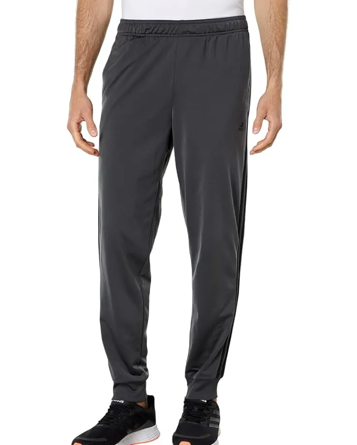 essentials_stripes_tricot_0-1.webp adidas Activewear | Pants<Essentials 3-Stripes Tricot Jogger Pants Black/Black 1